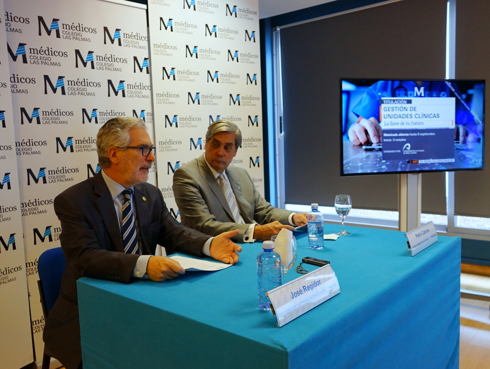 El Rector José Regidor (i) y el Presidente del Colegio de Médicos de Las Palmas